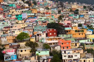 Colourful houses packed together in an informal settlement